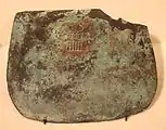 Copper tool bearing the serekh of Hor-Aha, on display at the Egyptian Museum of Berlin.