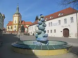 Masaryk Square with the museum and the Church of the Assumption of the Virgin Mary