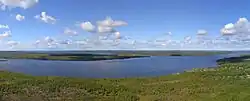 Lake Kuetsjarvi&nbsp;[no], seen from the east towards Norway. The strait between Kuetsjarvi and Svanevatn, with Salmiyarvi on the northern shore, is seen in the middle of the picture.