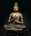 A gilt-wood statue of Vairocana Buddha, Heian period, 11th-12th century.