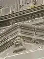 The woman in the south porch pediment.