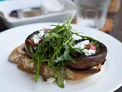 Grilled portobello, feta, and rocket salad on toasted baguette