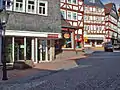 View of Westheimer Straße with two rediscovered examples of Homberg's historical water supply