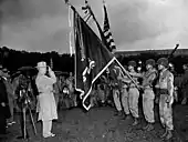 President Truman salutes the colors of the combined 100th Battalion, 442nd Infantry, during the presentation of the seventh Presidential Unit Citation.