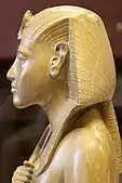 Profile of a statuette of Akhenaten wearing a nemes, c. 1351 – c. 1332 BC
