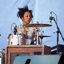 Alicia Warrington performing with Kate Nash at Lollapalooza in 2014