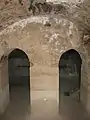 Inside the cistern behind the fountain.
