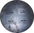 Back side of die. The wall thickness of the extrusion is 3&nbsp;mm (0.12&nbsp;in).