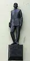 Anton Chekhov statue at the entrance of the gymnasium.