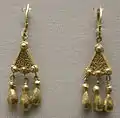 Pair of matching earrings with triple pendants