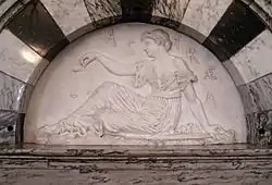 Astraea with her scales (astronomical symbol )