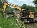 A road-rail digger being used to relay the line at the Loop Platform.