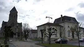 The church and town hall in Bétheniville