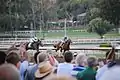 In the stretch, California Chrome leads by .mw-parser-output .frac{white-space:nowrap}.mw-parser-output .frac .num,.mw-parser-output .frac .den{font-size:80%;line-height:0;vertical-align:super}.mw-parser-output .frac .den{vertical-align:sub}.mw-parser-output .sr-only{border:0;clip:rect(0,0,0,0);clip-path:polygon(0px 0px,0px 0px,0px 0px);height:1px;margin:-1px;overflow:hidden;padding:0;position:absolute;width:1px}1+1⁄2 lengths
