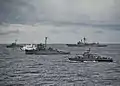BRP Salvador Abcede (PG-114), BRP Miguel Malvar (PS-19), BRP Iloilo (PS-32), BRP Pampanga (SARV-003), and USS Vandegrift (FFG-48) for a photo exercise (PHOTOEX) during CARAT 2012-Philippines