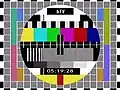 Off-air screen capture of PAL Philips circle pattern used by bTV transmitted with a digital clock between 2000 and 2002.