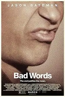 A close-up photo of a mans mouth, with his teeth showing and lower lip sticking out, as if about to utter an expletive