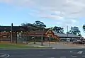 Station front and bus interchange in April 2011