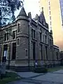 Gothic Revival-styled freestone coursed walls