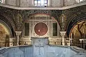 Golden Paleochristian rinceaux on a midnight blue mosaic background decorating the Baptistery of Neon from Ravenna (Italy), 5th century