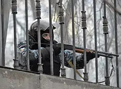 Berkut man pointing gut at protesters, January 19, 2014