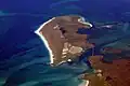 Image 18Aerial view of the low-lying island of Berneray in the Outer Hebrides, known for its sandy beaches backed by machairCredit: Doc Searls
