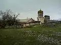 A view towards the church from the school yard