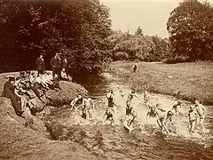 Boys nude and girls in suits - 1910