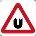 U-turn for oncoming traffic ahead