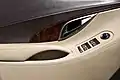 Door panel in 2nd generation Buick LaCrosse, showing the new distinctive curvaceous design theme with faux leather cover the entire door.