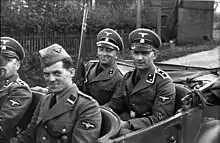SD men in Poland 1939. The SD men are wearing army shoulder straps, akin to the Waffen-SS.