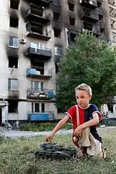 A damaged tower block in Lysychansk, 28 July 2014