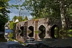 The Ancient bridge and ford at Bury .mw-parser-output .geo-default,.mw-parser-output .geo-dms,.mw-parser-output .geo-dec{display:inline}.mw-parser-output .geo-nondefault,.mw-parser-output .geo-multi-punct{display:none}.mw-parser-output .longitude,.mw-parser-output .latitude{white-space:nowrap}51°2′12.28″N 3°30′23.65″W﻿ / ﻿51.0367444°N 3.5065694°W﻿ / 51.0367444; -3.5065694