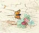 Image 8Butterfly and floral clips, worn in the mid and late 1990s. (from 1990s in fashion)