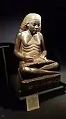 Scribe statue of Amenhotep, son of Hapu; circa 1390-1352 BC; granodiorite; height: 1.3 m; from Karnak (Egypt)