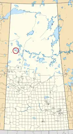 A map of the province of Saskatchewan showing 297 rural municipalities and hundreds of small Indian reserves. One is highlighted with a red circle.