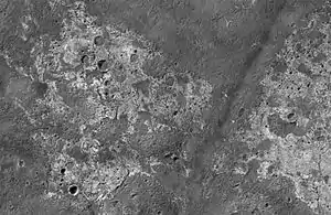 Channels in Candor plateau, as seen by HiRISE.  Location is Coprates quadrangle. Click on image to see many small, branched channels which are strong evidence for sustained precipitation.