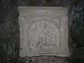 Central dedication stone, depicting the tauroctony.