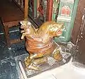 Two-faced dog at the base of the Choir gate