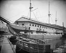 USS Constitution, today revered as "Old Ironsides", languished dismasted and boarded over as a barracks ship at the Charleston navy yard in Boston c. 1905