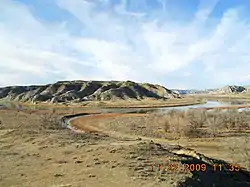 Cow Creek flowing into the Missouri River in Missouri Breaks, Montana