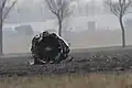 Both jet engines separated, coming to rest 100 m (330&nbsp;ft) from the fuselage