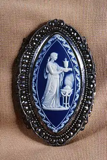 Belt clasp designed by Lady Templeton and Emma Crewe for Josiah Wedgwood's factory.  Jasperware, steel, tin.  The Walters Art Museum