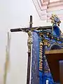 Christ crucified next to the altar of the Virgin of Rosary