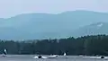 Crystal Lake in summer, with Belknap Mountain in distance