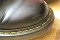 Distinctive yellow stitching on Dr. Martens shoe.