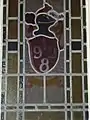Stained glass 1928 dedication window above entrance to Majestic cinema