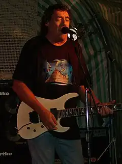 Stratton performing with Praying Mantis.