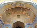 The mosque's iwans, or entry portals, are also decorated with tile work.