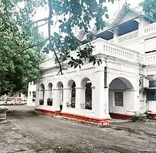 Dewas Collectorate Building (originally known as Lakshmi Niwas Palace of Dewas Junior). This was illegally demolished by the local administration in March 2023, despite of an ongoing case and strong opposition by the citizens of Dewas.